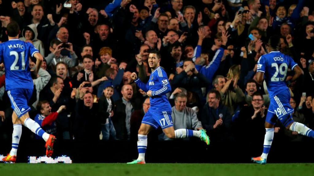 Eden Hazard  celebrates after scoring Chelsea’s second goal from the penalty spot during the  Premier League match against Tottenham Hotspur at Stamford Bridge. Photograph: Clive Rose/Getty Images