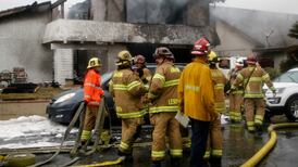 Five dead after plane parts fall from sky and crash into US house