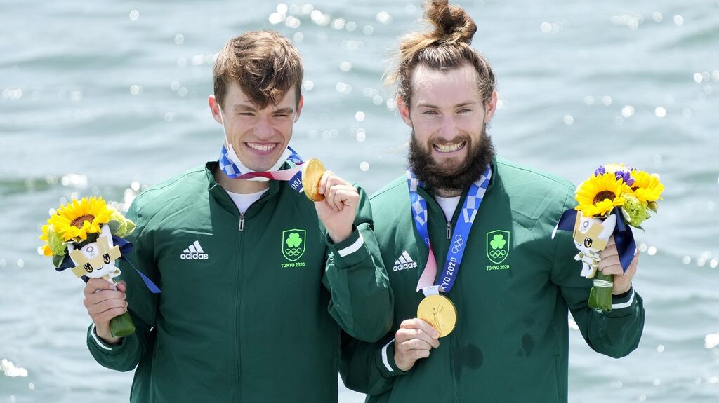 Fintan McCarthy (L) and Paul O’Donovan of Ireland pose with their gold medals after winning the Lightweight Men’s Double Sculls final during the Rowing events of the Tokyo 2020 Olympic Games at the Sea Forest Waterway in Tokyo, Japan. Photograph: Franck Robichon/EPA