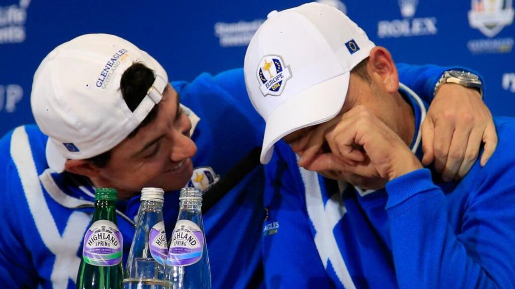 Rory McIlroy puts his arm around Sergio Garcia as he mocks being in tears following comments from Nick Faldo about the Spaniard’s performance under his captaincy at Valhalla in 2006. Photograph: Harry How/Getty Images