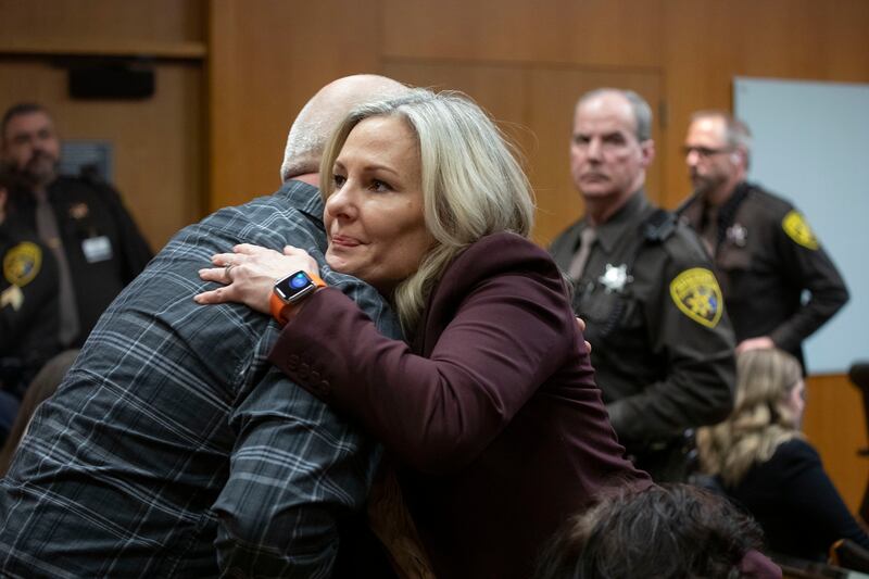Oakland County prosecutor Karen McDonald hugs Craig Shilling, the father of Justin Shilling, one of the four Oxford, Michigan High School students, after a jury found Jennifer Crumbley guilty on four counts of involuntary manslaughter. Photograph: Bill Pugliano/Getty Images