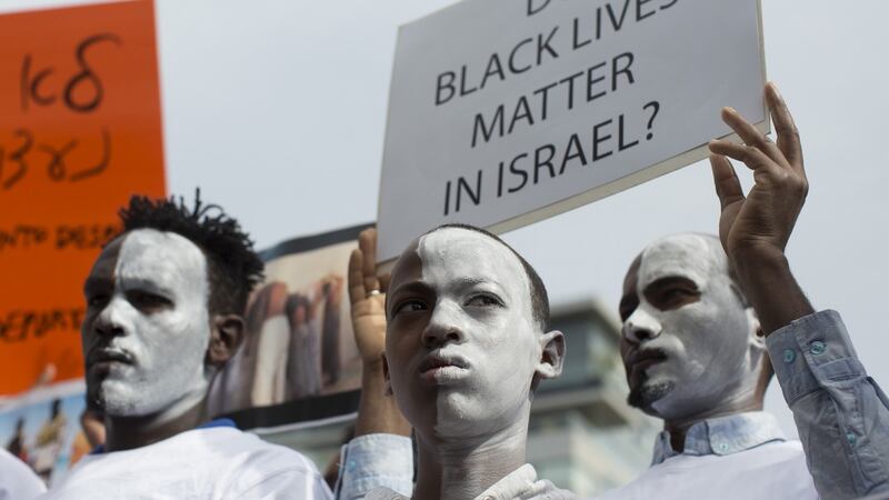 Rwandan refugees in Israel demonstrate after Israeli authorities decided to deport refugees.Photograph: Kobi Wolf/Anadolu Agency/Getty Images