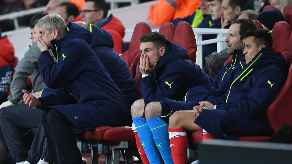 Arsene Wenger watches his team lose 5-1 at the Emirates Stadium last night. Photograph: Shaun Botterill/Getty Images