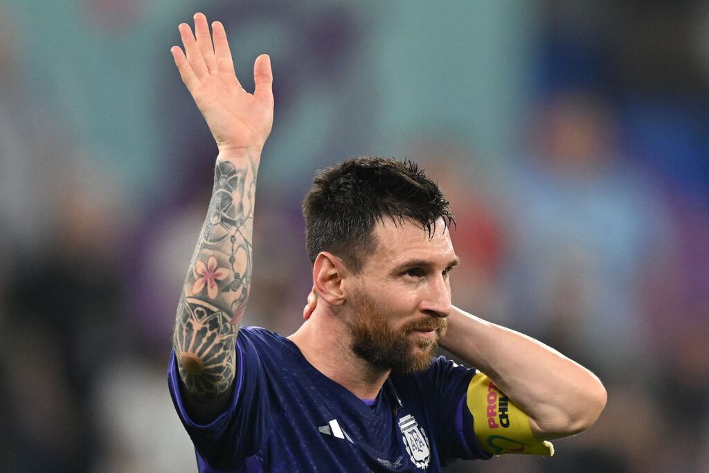 Argentina's forward Lionel Messi waves to supporters after his team beat Poland. Photograph: Andrej Isakovic/AFP via Getty