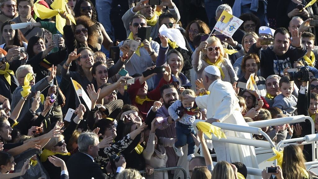 Pope Francis greets the crowd in Florence, Italy. Photograph: Andreas Solaro/AFP/Getty Images