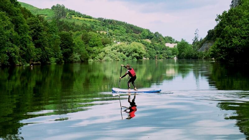 Paddle boarding on Embalse de Palombera Lake.