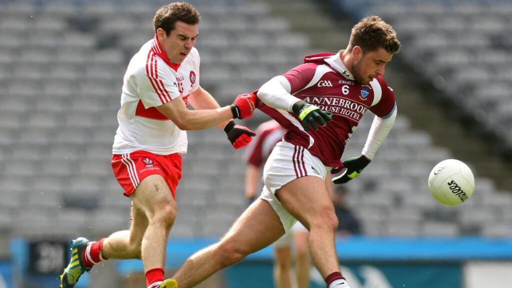 Westmeath’s Paul Sharry is tackled by Derry’s Benny Heron during the Division Two final last month. “It was severely disappointing to lose that day,” says Sharry, “a great chance to bring some silverware back to Westmeath.” Photograph: Inpho