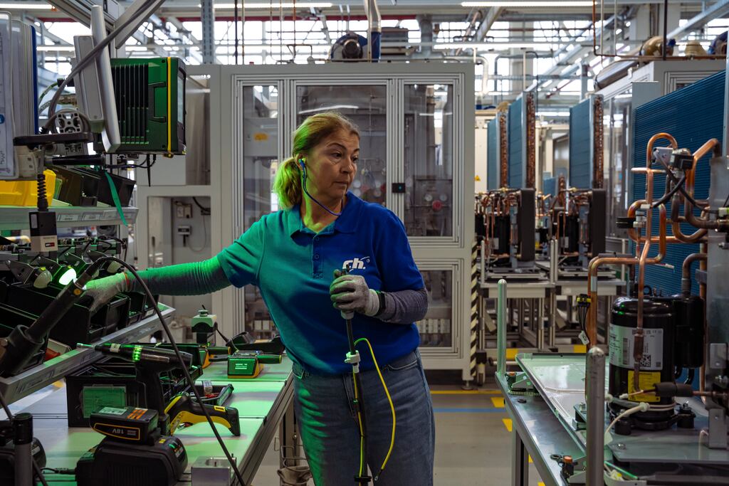 A worker at an assembly station Vaillant’s factory in Remscheid, Germany. German factory orders fell less than feared in November (Photograph: Patrick Junker/The New York Times)