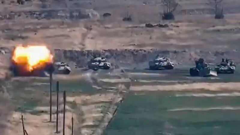 An Azeri armourd detachment comes under fire in Nagorno-Karabakh. Photograph: EPA