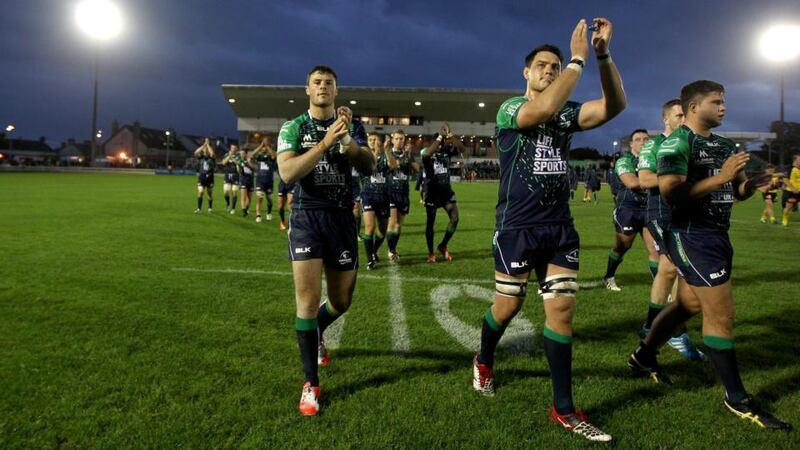 Connacht’s Robbie Henshaw and Quinn Roux and team-mates applaud the home support after victory over La Rochelle at the Sportsground.   Photograph: Ryan Byrne / Inpho