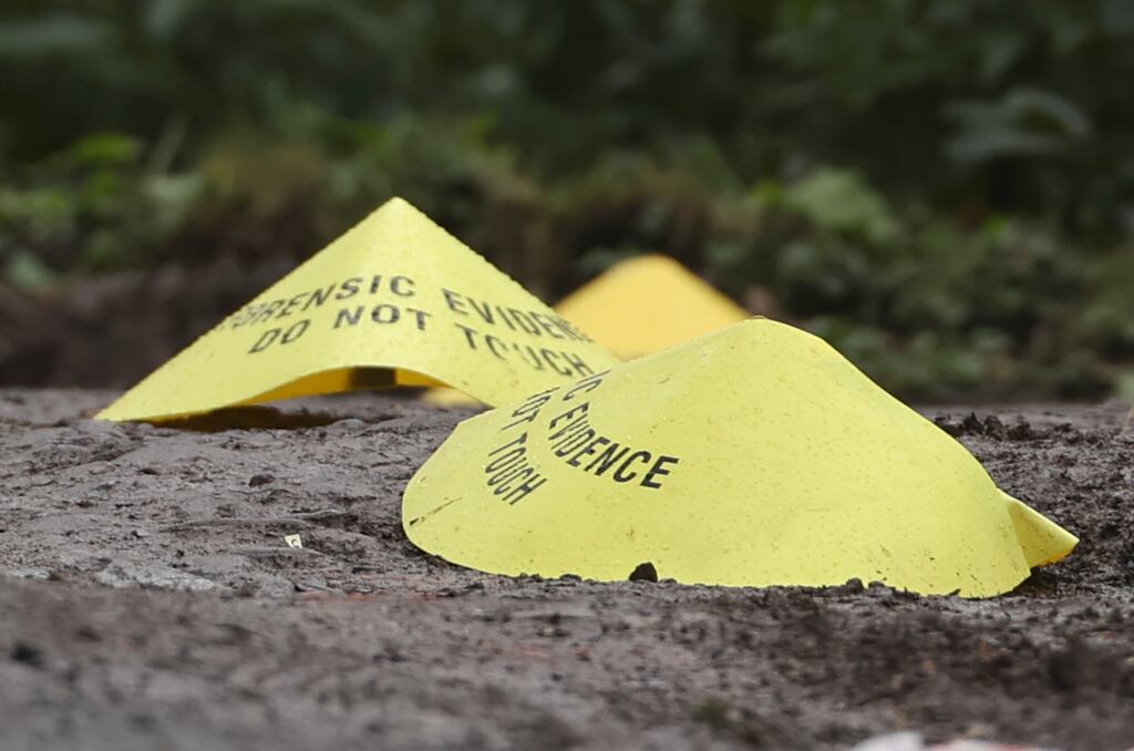 Forensic evidence markers at the scene of the recent shooting of PSNI Det Chief Insp John Caldwell in Omagh, Co Tyrone. Photograph: PA Images