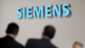 Siemens steps up cost-saving programme to tackle downturn