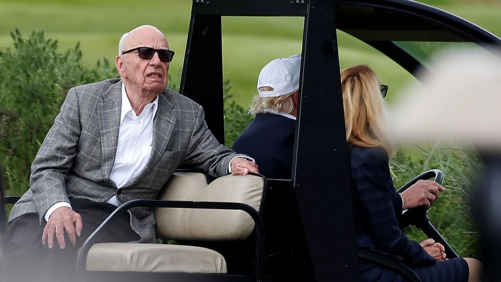 Rupert Murdoch at Trump International Golf Links in Aberdeen, Scotland, with Donald Trump and Murdoch’s wife Jerry Hall, in June 2016. File photograph: Carlo Allegri/Reuters