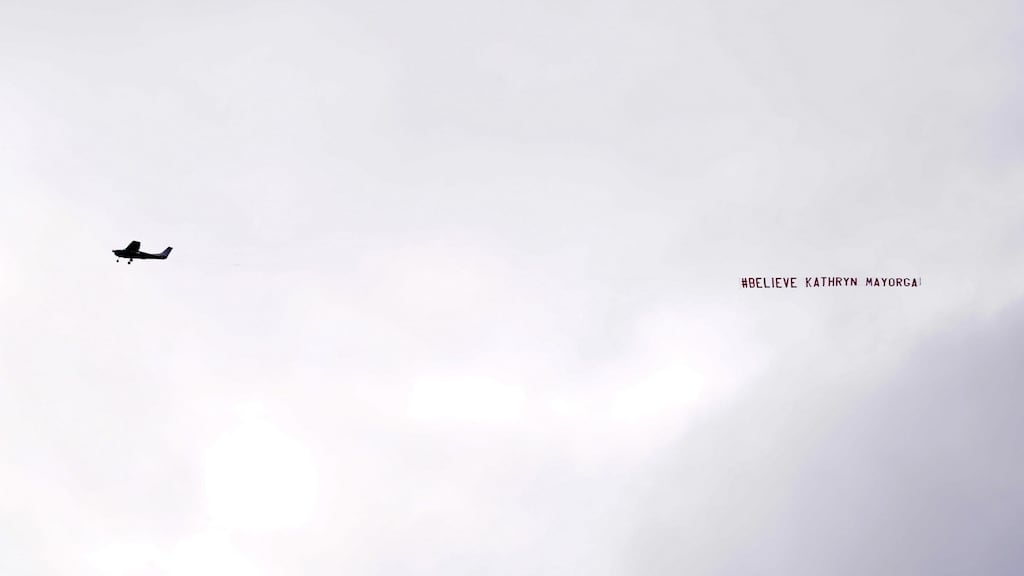 A banner reading ‘#Believe Kathryn Mayorga’ flies over Old Trafford during the Premier League game between Manchester United and Newcastle United. Photograph: Martin Rickett/PA Wire