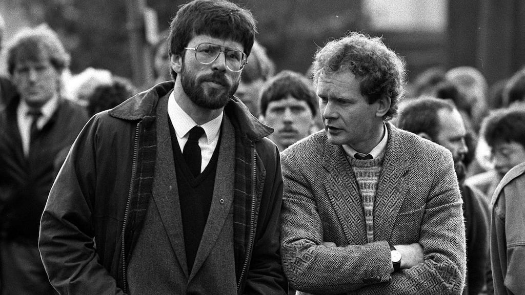 Sinn Féin president Gerry Adams with Martin McGuinness at a funeral in May 1987. Photograph: PA Wire