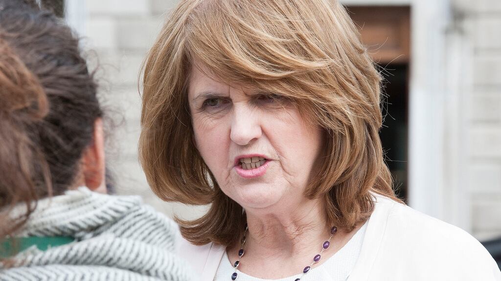 Joan Burton  outside Leinster House  after the announcement that Enda Kenny had been voted in as Taoiseach. Photograph: Dave Meehan