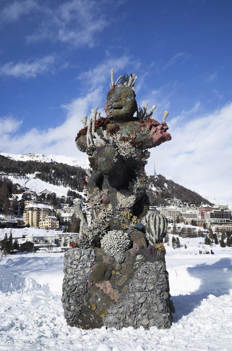 Damien Hirst, Two Figures with a Drum, 2013. Installed in St. Moritz, 2021. Photographed by Felix Friedmann ©Damien Hirst and Science Ltd. All rights reserved, DACS 2021