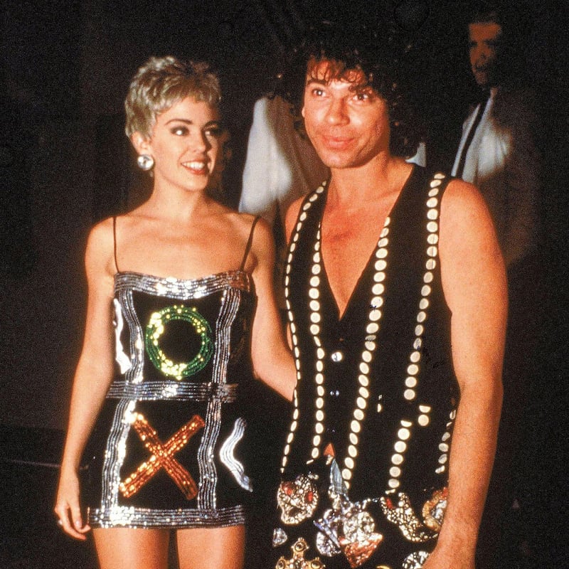 Kylie Minogue with Michael Hutchence, whom she left Donovan for, in 1992. Photograph: Mick Hutson/Redferns via Getty