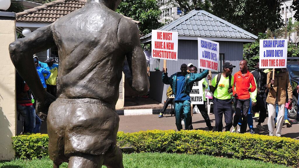 Kenyan athletes, holding placards and chanting, protest at the offices of Athletics Kenya (AK) offices in Nairobi earlier this month. Photograph: Getty Images