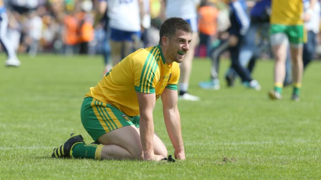 Donegal’s Paddy McGrath collapses to the ground dejected at the end of this year’s Ulster SFC final against Monaghan. Photograph: Inpho