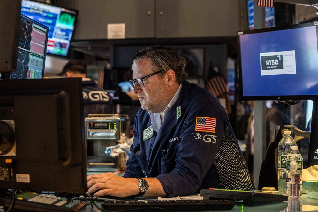 The floor of the New York Stock Exchange in New York. US stocks fell into a bear market on Monday, a decline of more than 20 percent from their peak in January, a sign of growing pessimism about the outlook for the economy. Photograph: Hiroko Masuike/The New York Times