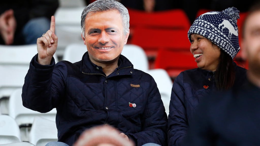 A Chelsea fan with a Jose Mourinho mask at the Brittania Stadium where the manager was absent due to a stadium ban. Photo: Ed Sykes/Reuters