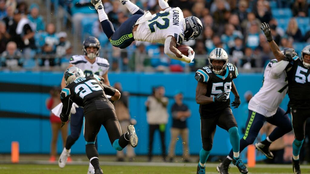 Chris Carson flips during the Seattle Seahawks win over the Carolina Panthers. Photograph: Grant Halverson/Getty