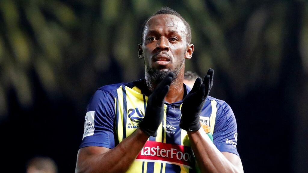 Usain Bolt in action for the Central Coast Mariners. Photograph: David Gray/Reuters