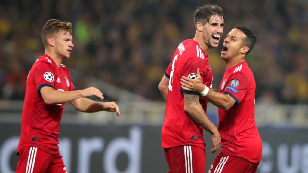 Bayern Munich’s Javier Martinez (centre) celebrates with team-mates after scoring his team’s first goal in the Champions League game against AEK Athens at the Olympic Stadium in Athens. Photograph: Alexander Hassenstein/Bongarts/Getty Images
