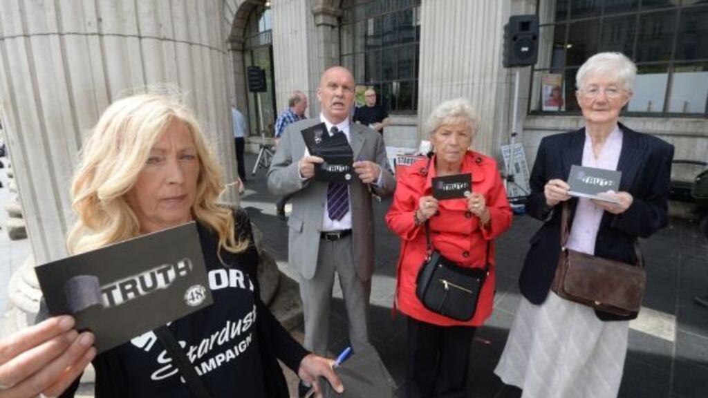 Antoinette Keegan, Eugene Kelly, Christine Keegan and Bridget McDermott hand out postcards outside the GPO Dublin, as part of the Stardust Postcard Campaign seeking a new inquest into tragedy. Photograph: Dara Mac Dónaill / The Irish Times