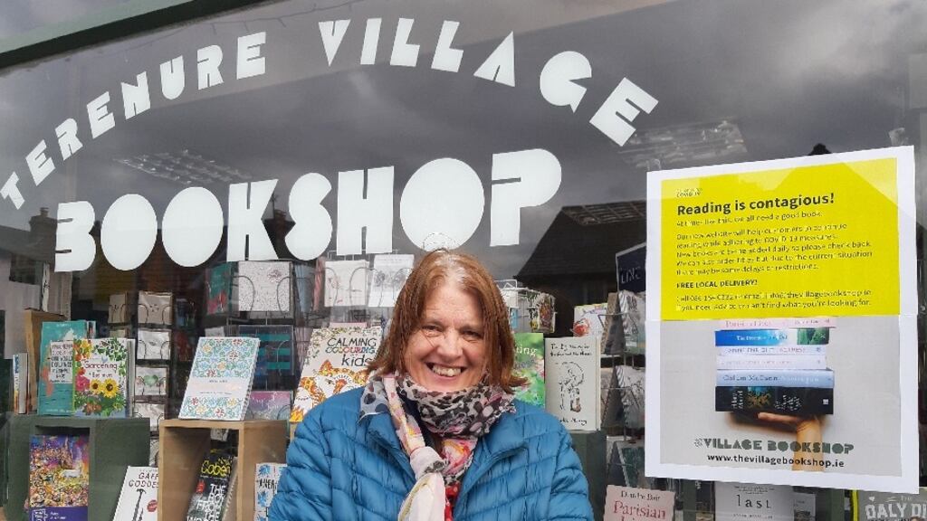 Alice Walsh, outside her Village Bookshop in Terenure, Dublin, says that since being ordered by the Government to close to help halt the spread of coronavirus, sales have halved.