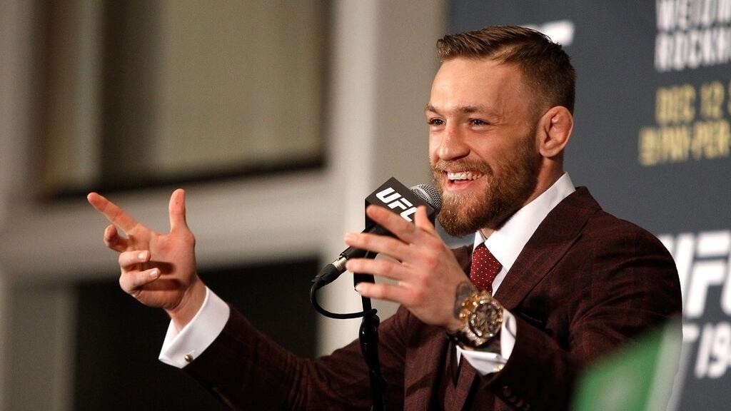 Conor McGregor speaks at a post-fight press conference after beating José Aldo in their featherweight title fight during UFC 194 at MGM Grand Garden Arena on December 12th, 2015 in Las Vegas, Nevada. Photograph: Steve Marcus/Getty Images