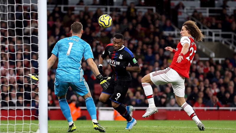 Crystal Palace’s Jordan Ayew scores his side’s second goal during the Premier League match against Arsenal at the Emirates Stadium. Photograph: Nigel French/PA Wire
