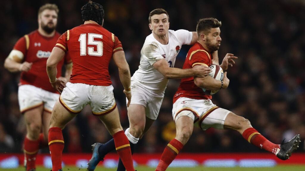 England’s George Ford high-tackles Wales’ scrumhalf Rhys Webb at the Principality Stadium in Cardiff. Photograph: Getty Images