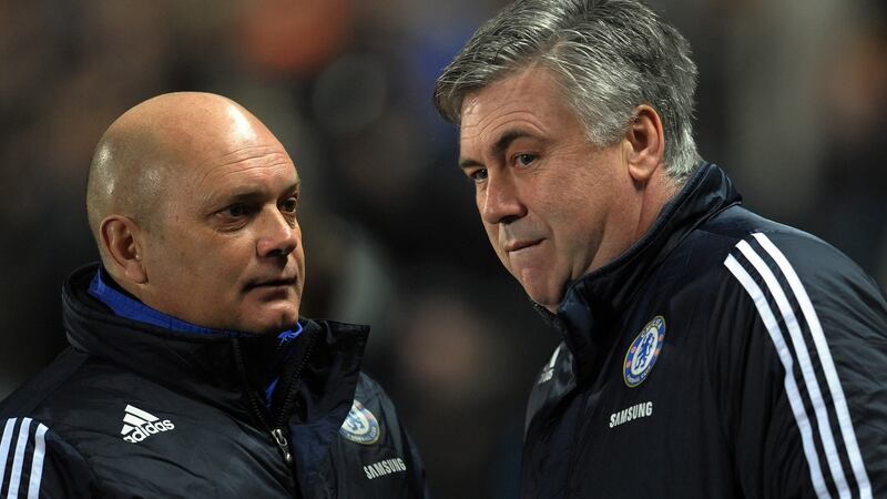 Ray Wilkins (L) with Carlo Ancelotti - the pair won the first league and cup double in Chelsea’s history in 2009/10. Photograph: Paul Ellis/AFP