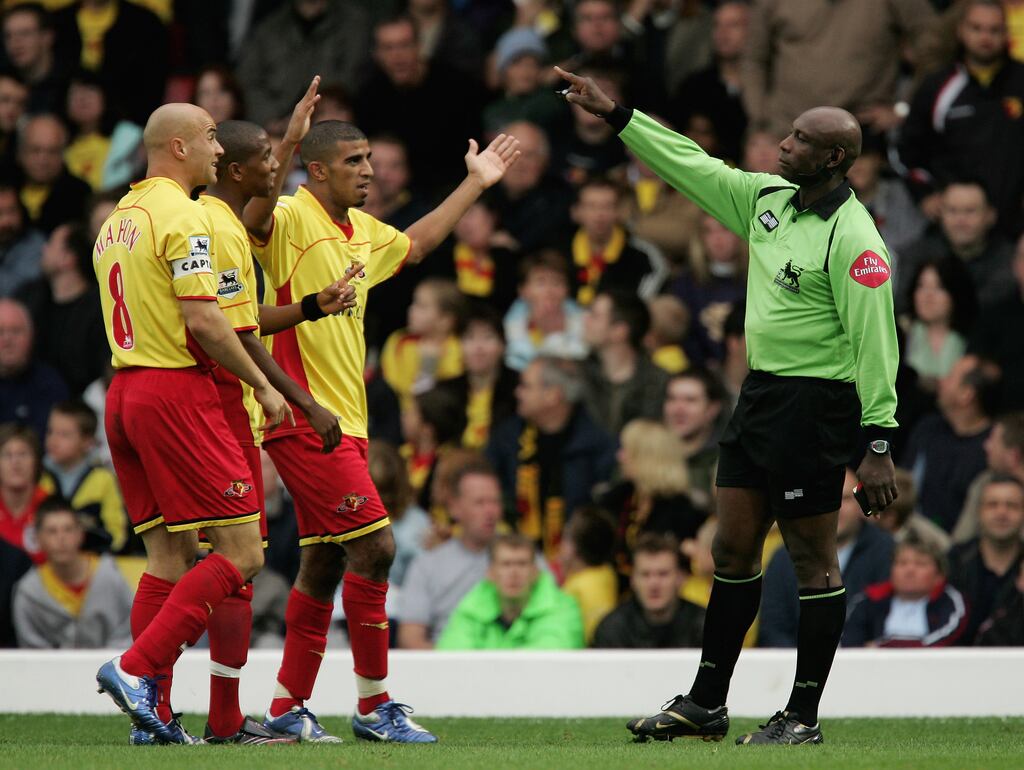 Referee Uriah Rennie sends Watford players away during a Premiership match between Watford and Tottenham Hotspur at Vicarage Road on October 28, 2006 in Watford. Photograph: Richard Heathcote/Getty Images