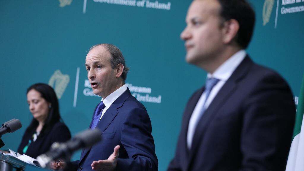 Tánaiste Leo Varadkar (right), pictured with Minister for Culture Catherine Martin and Taoiseach Micheál Martin, said the advice to work from home “remains the same”. Photograph: Julien Behal