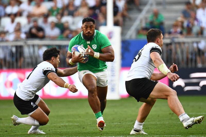 Ireland's Bundee Aki runs at the Romanian defence during the opening Rugby World Cup game in Bordeaux. Photograph: Christophe Archambault/AFP via Getty Images