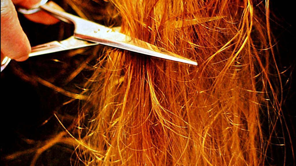 I ignored the disapproving look on her ageing, Botox-filled face and smiled at the wavy tufts of red hair that now exposed my ears. Photograph: Getty Images