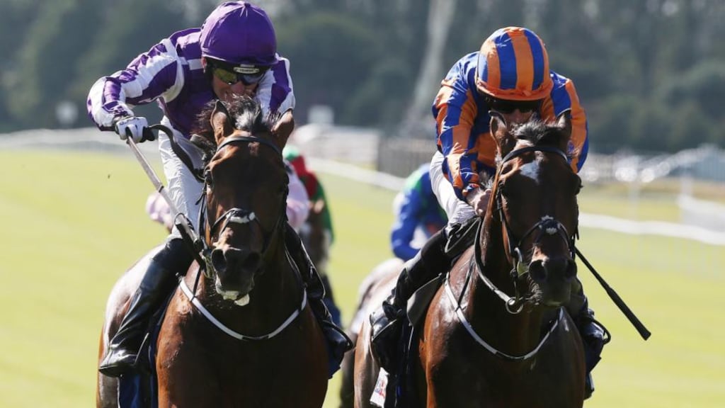 Seamus Heffernan on Bondi Beach (left) wins the At the Races Curragh Cup from  Ryan Moore on Order of St.George. Photograph: Lorraine O’Sullivan/Inpho