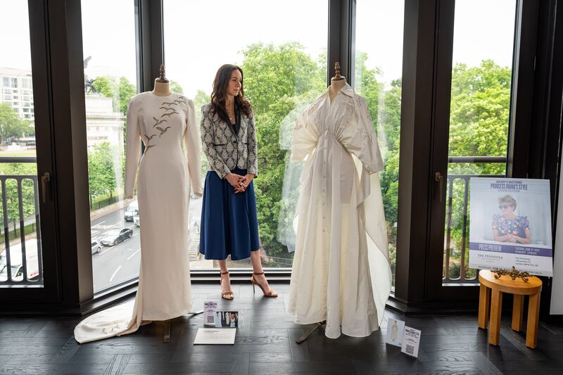 Princess Diana Falcon Evening Gown, left. Photograph: Aaron Chown/PA