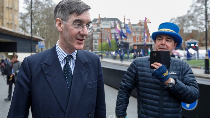 Anti-Brexit activist Steve Bray tries to engage Conservative MP Jacob Rees-Mogg in conversation. Bray posts clips of interviews on his Facebook channel. Photographer: Luke MacGregor/Bloomberg