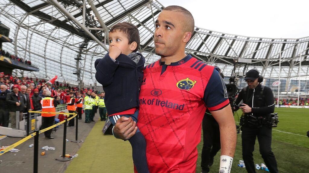 Munster’s Simon Zebo with his son Jacob after the European Champions Cup, semi-final match against Saracens at the Aviva Stadium. Photograph: Lorraine O’Sullivan/PA Wire