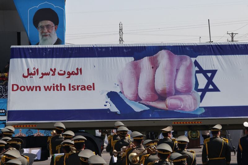 Iranian soldiers take part in a military parade during a ceremony marking the country's annual army day in the capital, Tehran, on April 18th, 2023. The portrait is that of Iran's supreme leader, Ayatollah Ali Khamenei. Photograph: Atta Kenare/AFP/Getty