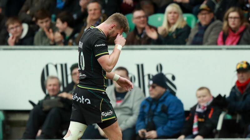 Dan Biggar limps off during Northampton’s big win over Sale. Photograph: David Rogers/Getty