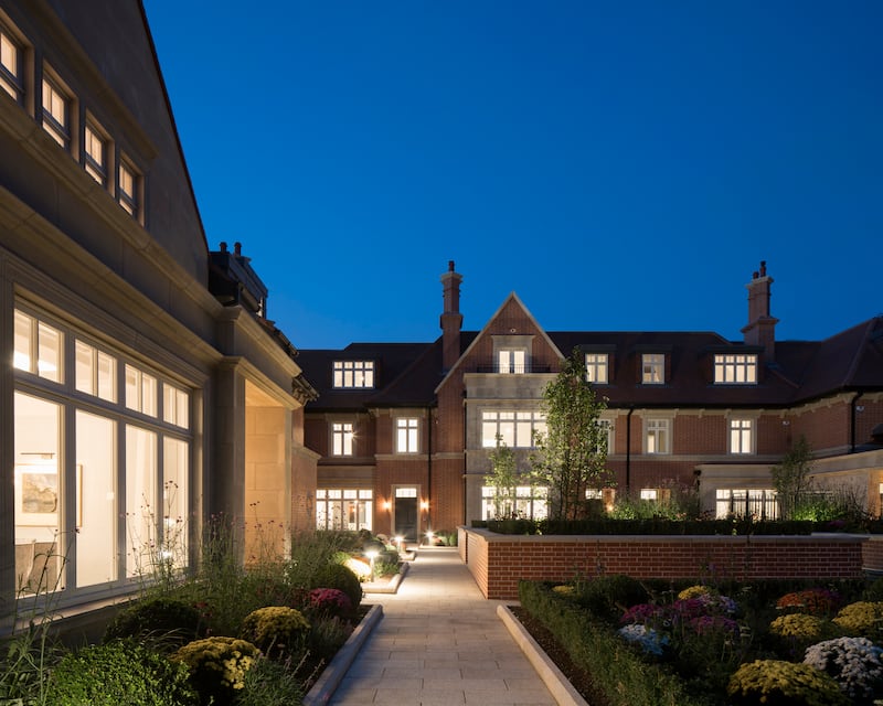 The landscaped communal gardens to the front of the houses