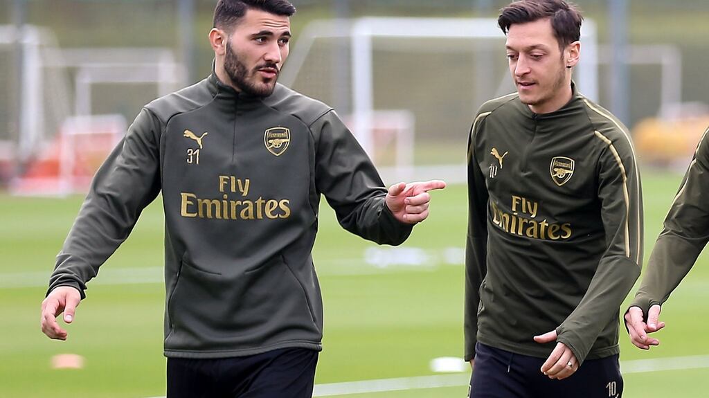 Sead Kolasinac and Mesut Ozil: Took part in training  and are available for selection for the home clash against Burnley. Photograph: Nigel French/PA Wire.