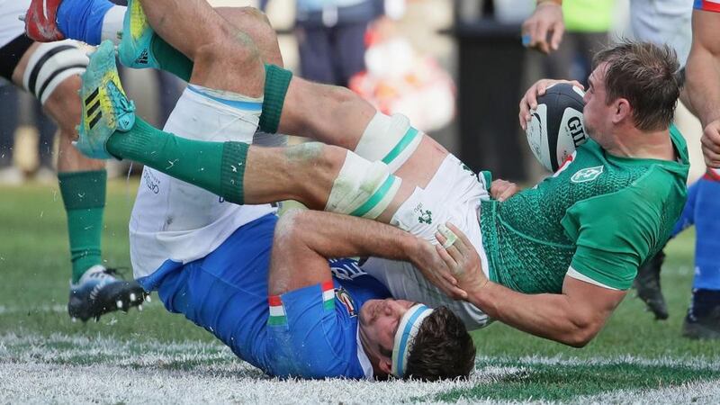 Ruddock is brought down by Marco Fuser. Photo: Jonathan Daniel/Getty Images