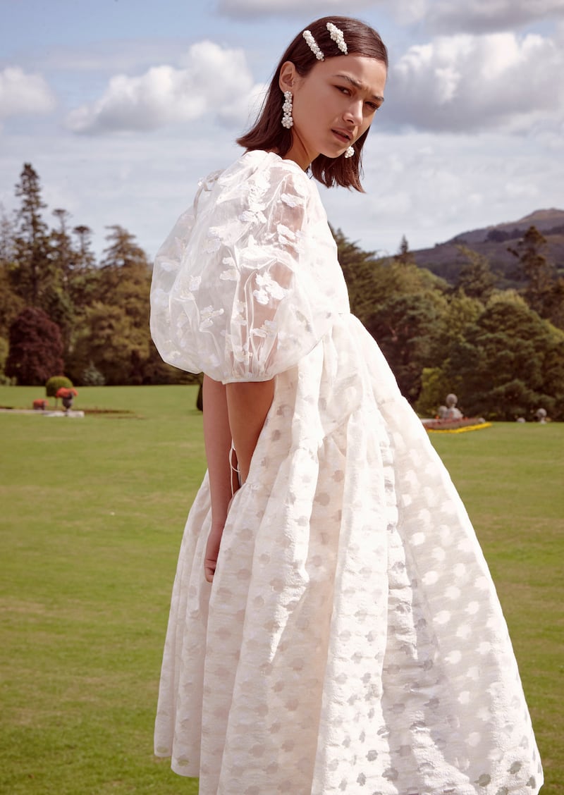 White dress €1735, top €810 Cecilie Bahnsen, earrings €250, clips €85 and €105 by Simone Rocha.