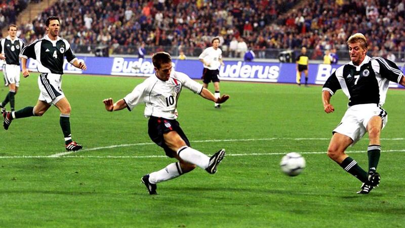 England's Michael Owen beating Marko Rehmer (right) to score his hat-trick and England's fourth goal against Germany during the Fifa World Cup Qualifiers. Photograph: PA
